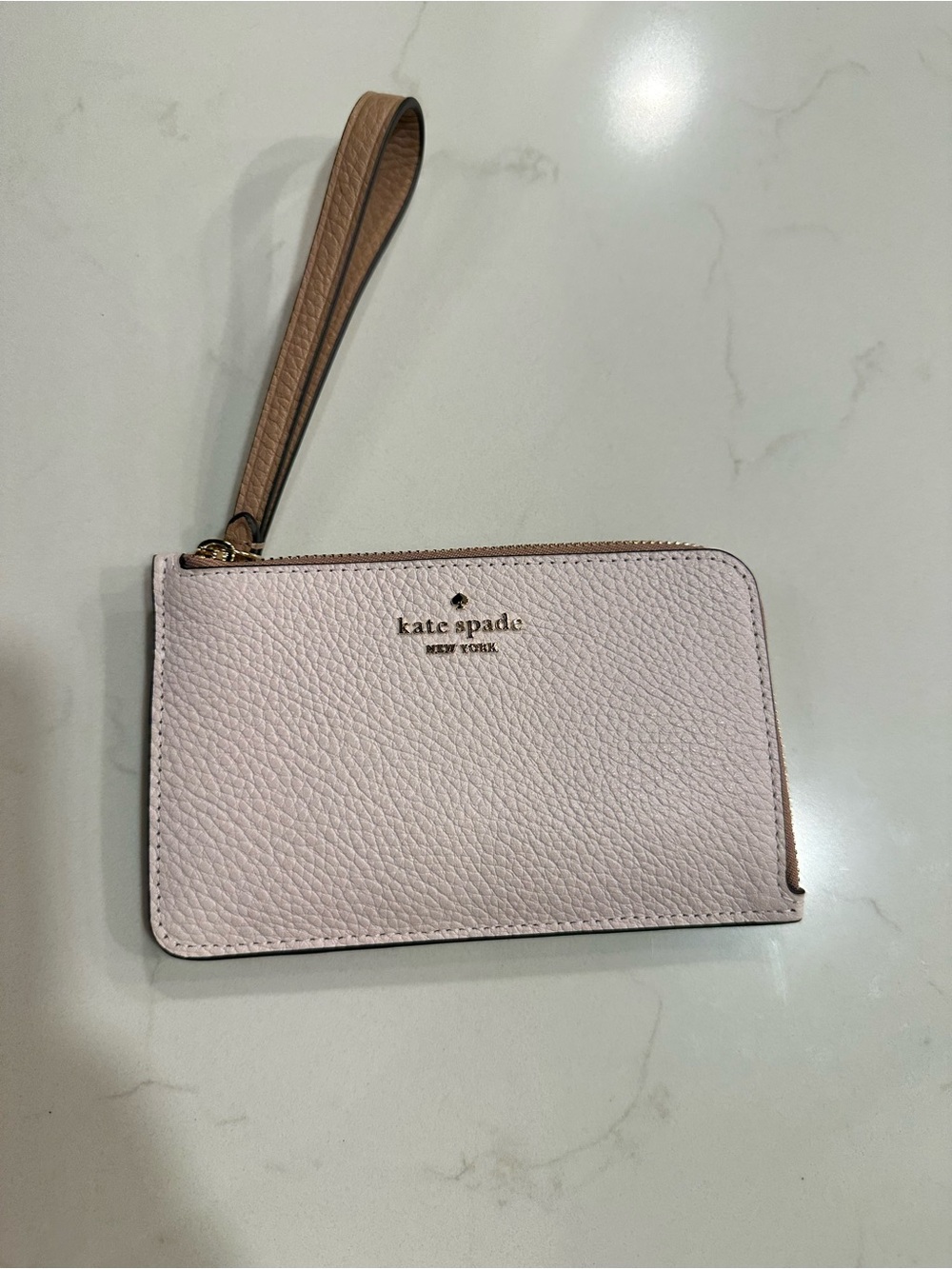 kate spade Pale Pink Pebbled Leather Wristlet with Brown Strap